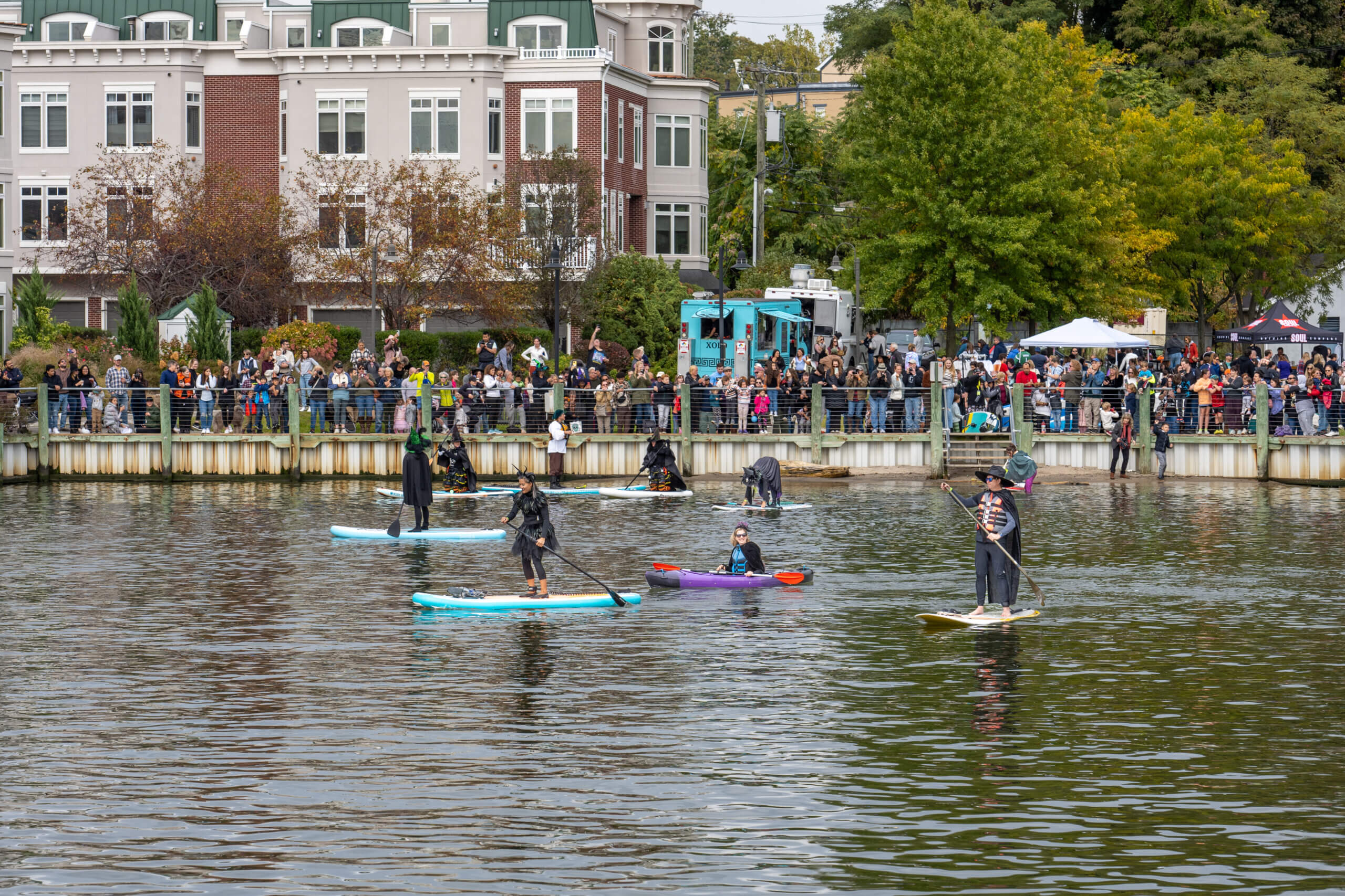 Paddle Boarders in Witch Costumes Welcome Halloween - The New York Times